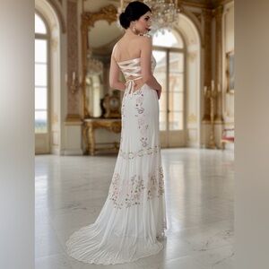 Elegant White Backless Dress with Floral Accents